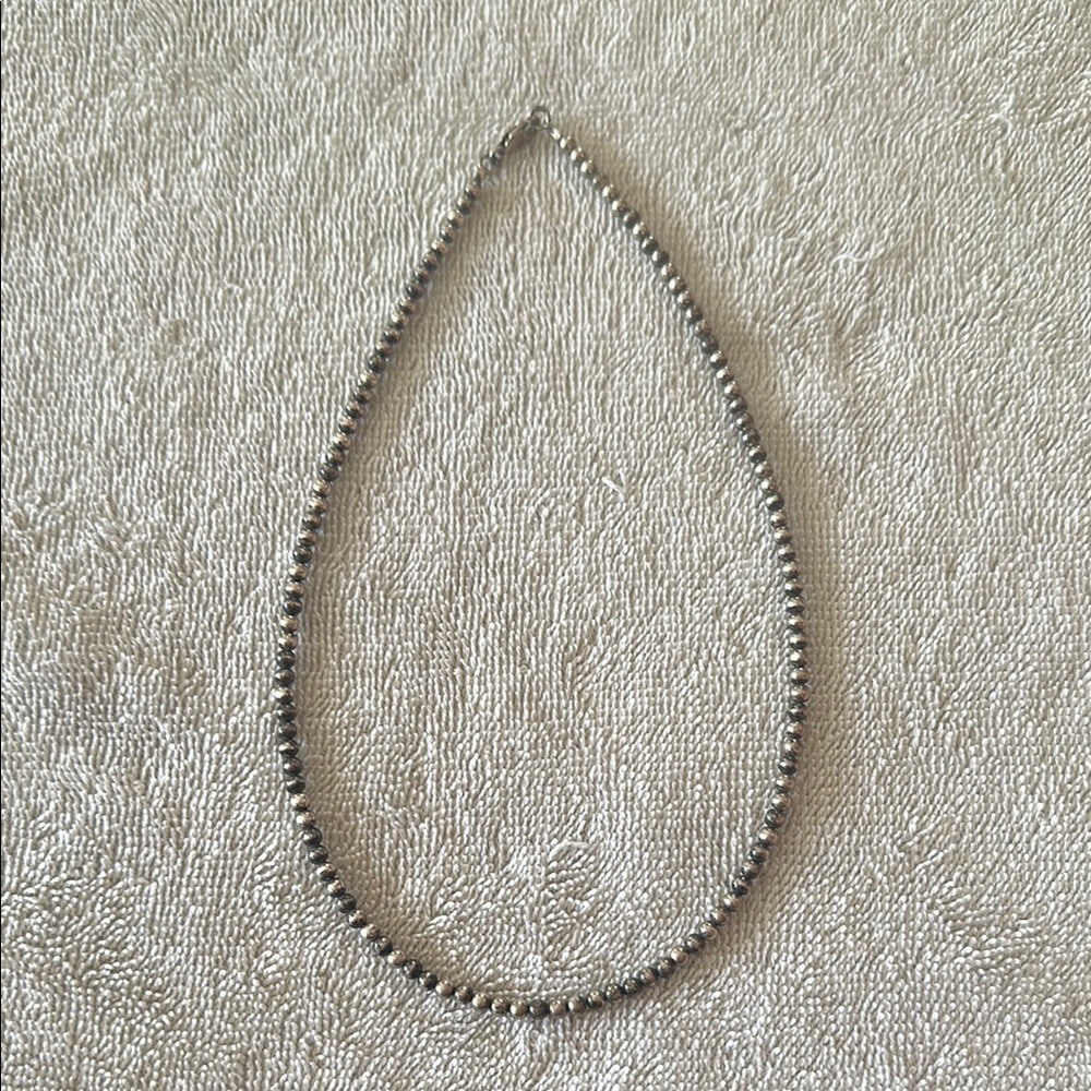 Silver Beaded Necklace with Teardrop Design